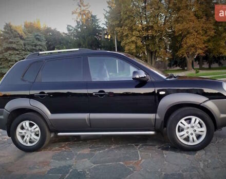 Черный Хендай Туксон, объемом двигателя 2 л и пробегом 230 тыс. км за 8600 $, фото 113 на Automoto.ua