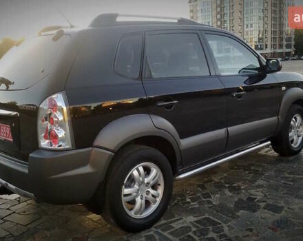 Черный Хендай Туксон, объемом двигателя 2 л и пробегом 230 тыс. км за 8600 $, фото 20 на Automoto.ua