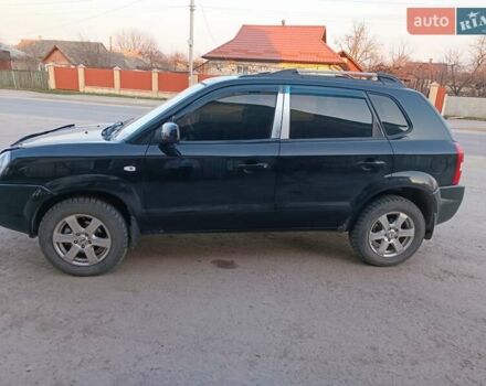 Чорний Хендай Туксон, об'ємом двигуна 2 л та пробігом 204 тис. км за 8000 $, фото 3 на Automoto.ua