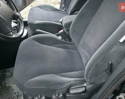 Чорний Хендай Туксон, об'ємом двигуна 2 л та пробігом 207 тис. км за 8200 $, фото 29 на Automoto.ua