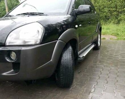 Черный Хендай Туксон, объемом двигателя 1.98 л и пробегом 193 тыс. км за 8000 $, фото 2 на Automoto.ua