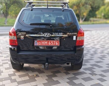 Чорний Хендай Туксон, об'ємом двигуна 2 л та пробігом 190 тис. км за 8300 $, фото 7 на Automoto.ua