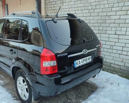 Черный Хендай Туксон, объемом двигателя 1.98 л и пробегом 335 тыс. км за 7800 $, фото 19 на Automoto.ua