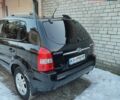 Черный Хендай Туксон, объемом двигателя 1.98 л и пробегом 335 тыс. км за 7800 $, фото 19 на Automoto.ua