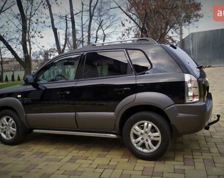 Чорний Хендай Туксон, об'ємом двигуна 2 л та пробігом 229 тис. км за 8600 $, фото 32 на Automoto.ua