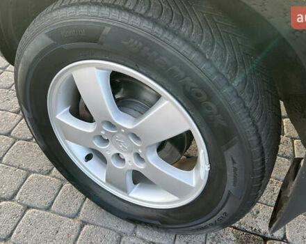 Черный Хендай Туксон, объемом двигателя 1.98 л и пробегом 243 тыс. км за 8500 $, фото 21 на Automoto.ua