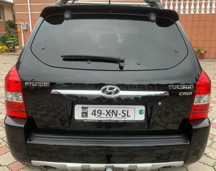 Черный Хендай Туксон, объемом двигателя 2 л и пробегом 219 тыс. км за 8600 $, фото 4 на Automoto.ua