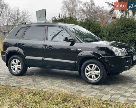 Черный Хендай Туксон, объемом двигателя 2 л и пробегом 180 тыс. км за 7700 $, фото 9 на Automoto.ua