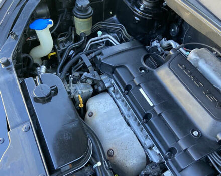 Черный Хендай Туксон, объемом двигателя 1.98 л и пробегом 197 тыс. км за 8000 $, фото 47 на Automoto.ua