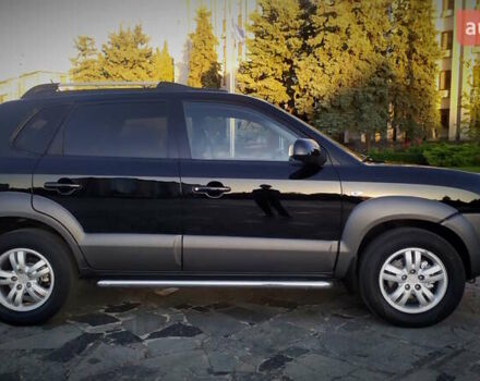 Черный Хендай Туксон, объемом двигателя 2 л и пробегом 230 тыс. км за 8600 $, фото 35 на Automoto.ua