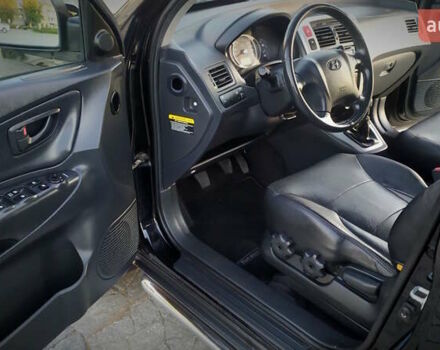 Черный Хендай Туксон, объемом двигателя 2 л и пробегом 230 тыс. км за 8600 $, фото 147 на Automoto.ua