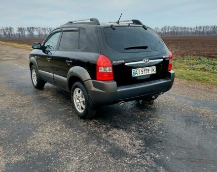 Черный Хендай Туксон, объемом двигателя 2 л и пробегом 272 тыс. км за 7500 $, фото 18 на Automoto.ua