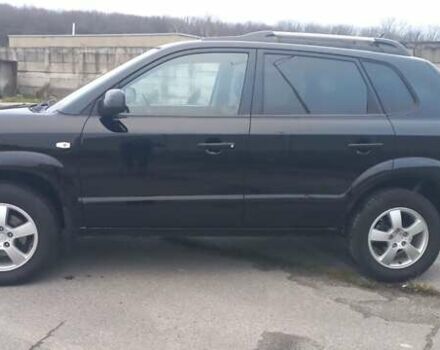 Черный Хендай Туксон, объемом двигателя 1.98 л и пробегом 155 тыс. км за 7999 $, фото 5 на Automoto.ua