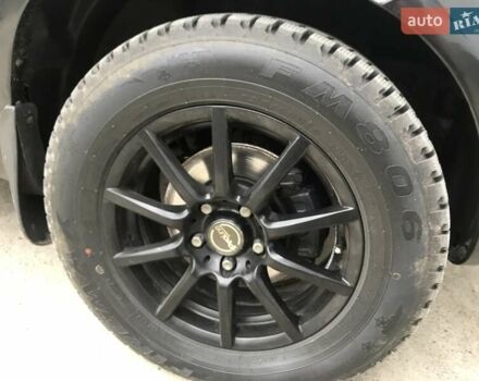 Черный Хендай Туксон, объемом двигателя 2 л и пробегом 210 тыс. км за 8999 $, фото 62 на Automoto.ua