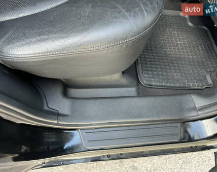 Черный Хендай Туксон, объемом двигателя 2 л и пробегом 256 тыс. км за 7800 $, фото 11 на Automoto.ua