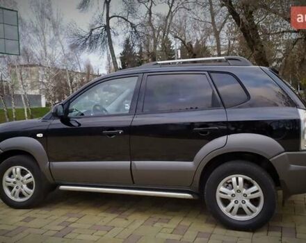 Чорний Хендай Туксон, об'ємом двигуна 2 л та пробігом 229 тис. км за 8600 $, фото 51 на Automoto.ua
