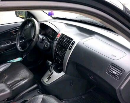 Черный Хендай Туксон, объемом двигателя 2 л и пробегом 193 тыс. км за 8000 $, фото 2 на Automoto.ua