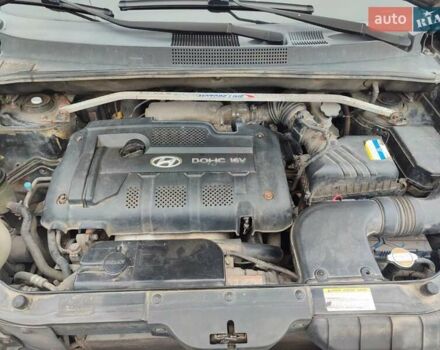 Черный Хендай Туксон, объемом двигателя 2 л и пробегом 270 тыс. км за 6800 $, фото 18 на Automoto.ua