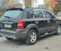 Черный Хендай Туксон, объемом двигателя 2 л и пробегом 270 тыс. км за 6800 $, фото 9 на Automoto.ua