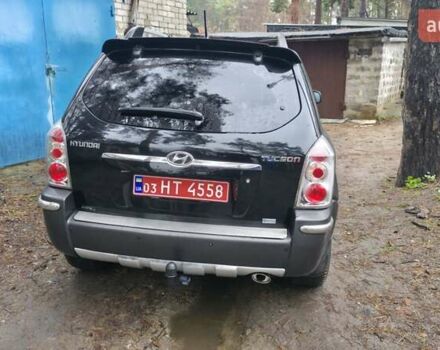 Чорний Хендай Туксон, об'ємом двигуна 2 л та пробігом 207 тис. км за 8200 $, фото 4 на Automoto.ua