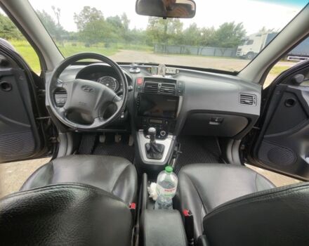 Черный Хендай Туксон, объемом двигателя 2 л и пробегом 160 тыс. км за 7600 $, фото 15 на Automoto.ua