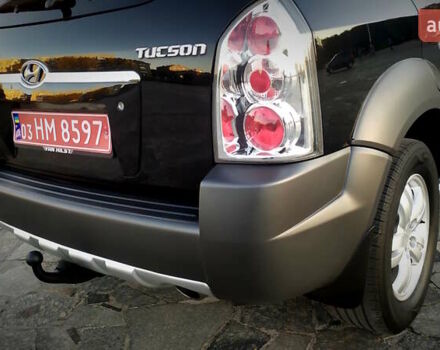 Черный Хендай Туксон, объемом двигателя 2 л и пробегом 230 тыс. км за 8600 $, фото 70 на Automoto.ua