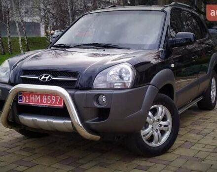 Чорний Хендай Туксон, об'ємом двигуна 2 л та пробігом 229 тис. км за 8600 $, фото 4 на Automoto.ua