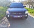 Черный Хендай Туксон, объемом двигателя 2 л и пробегом 262 тыс. км за 7800 $, фото 1 на Automoto.ua
