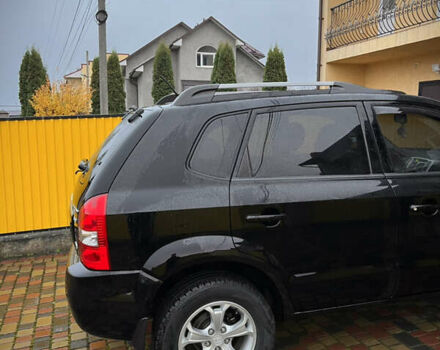 Черный Хендай Туксон, объемом двигателя 2 л и пробегом 151 тыс. км за 9100 $, фото 6 на Automoto.ua