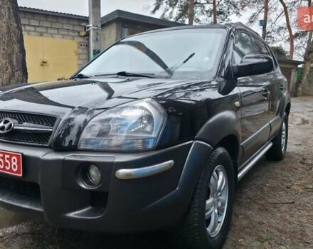 Чорний Хендай Туксон, об'ємом двигуна 2 л та пробігом 207 тис. км за 8200 $, фото 1 на Automoto.ua