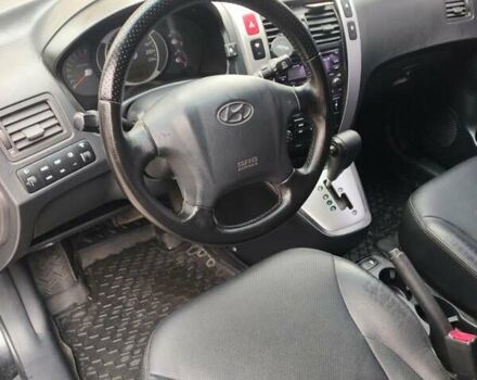 Черный Хендай Туксон, объемом двигателя 2.7 л и пробегом 280 тыс. км за 7200 $, фото 12 на Automoto.ua