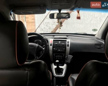 Черный Хендай Туксон, объемом двигателя 2 л и пробегом 210 тыс. км за 8999 $, фото 42 на Automoto.ua