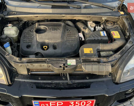 Черный Хендай Туксон, объемом двигателя 1.98 л и пробегом 243 тыс. км за 8500 $, фото 41 на Automoto.ua