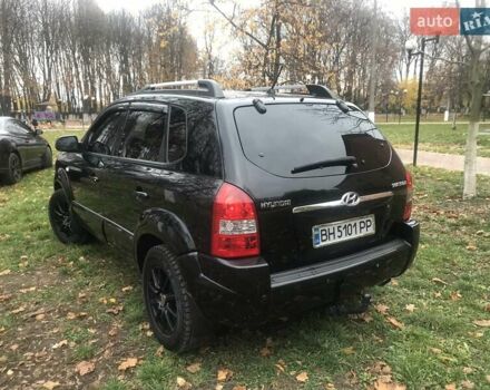 Черный Хендай Туксон, объемом двигателя 2 л и пробегом 210 тыс. км за 8999 $, фото 27 на Automoto.ua