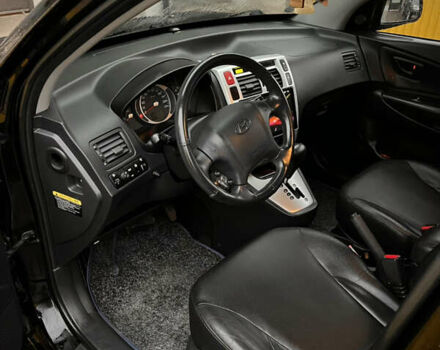 Черный Хендай Туксон, объемом двигателя 2 л и пробегом 151 тыс. км за 9100 $, фото 10 на Automoto.ua