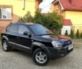 Черный Хендай Туксон, объемом двигателя 2 л и пробегом 174 тыс. км за 7600 $, фото 1 на Automoto.ua