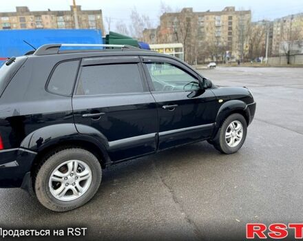 Черный Хендай Туксон, объемом двигателя 2 л и пробегом 190 тыс. км за 7800 $, фото 8 на Automoto.ua