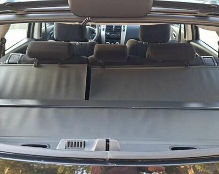 Черный Хендай Туксон, объемом двигателя 2 л и пробегом 190 тыс. км за 8150 $, фото 14 на Automoto.ua