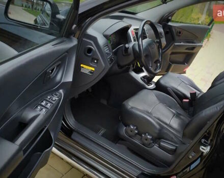 Чорний Хендай Туксон, об'ємом двигуна 2 л та пробігом 229 тис. км за 8600 $, фото 103 на Automoto.ua