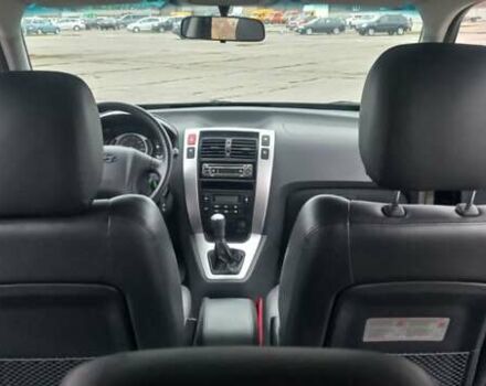 Черный Хендай Туксон, объемом двигателя 1.98 л и пробегом 155 тыс. км за 7999 $, фото 39 на Automoto.ua