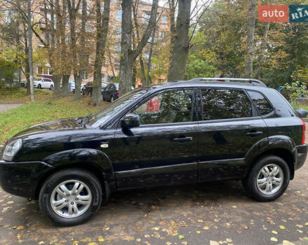 Черный Хендай Туксон, объемом двигателя 2 л и пробегом 178 тыс. км за 7860 $, фото 7 на Automoto.ua