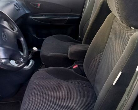 Черный Хендай Туксон, объемом двигателя 2 л и пробегом 236 тыс. км за 8300 $, фото 7 на Automoto.ua