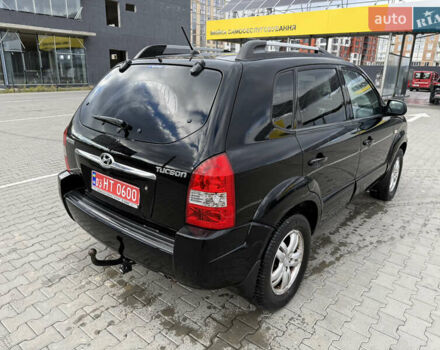 Черный Хендай Туксон, объемом двигателя 2 л и пробегом 182 тыс. км за 6999 $, фото 5 на Automoto.ua
