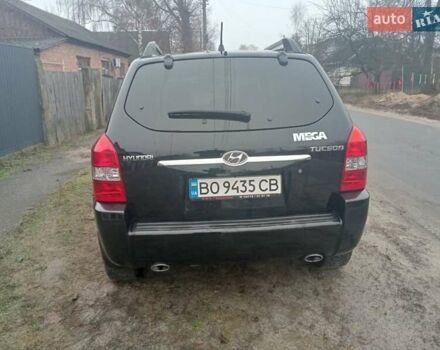 Черный Хендай Туксон, объемом двигателя 1.99 л и пробегом 235 тыс. км за 9000 $, фото 3 на Automoto.ua
