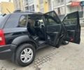 Черный Хендай Туксон, объемом двигателя 1.98 л и пробегом 147 тыс. км за 8000 $, фото 11 на Automoto.ua
