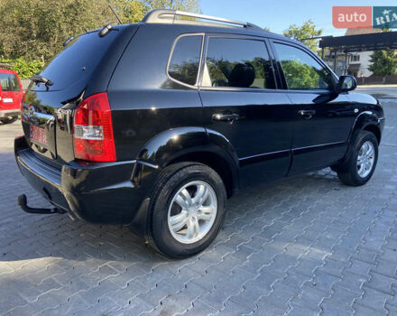 Черный Хендай Туксон, объемом двигателя 1.98 л и пробегом 197 тыс. км за 8000 $, фото 4 на Automoto.ua