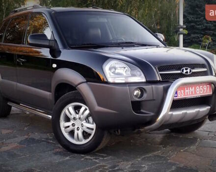 Черный Хендай Туксон, объемом двигателя 2 л и пробегом 230 тыс. км за 8600 $, фото 96 на Automoto.ua