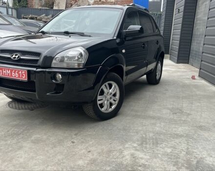 Черный Хендай Туксон, объемом двигателя 2 л и пробегом 179 тыс. км за 8000 $, фото 1 на Automoto.ua