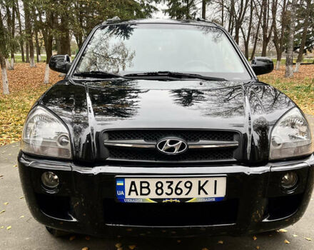 Черный Хендай Туксон, объемом двигателя 1.98 л и пробегом 99 тыс. км за 8999 $, фото 3 на Automoto.ua