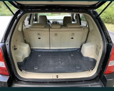 Черный Хендай Туксон, объемом двигателя 2 л и пробегом 208 тыс. км за 8100 $, фото 3 на Automoto.ua